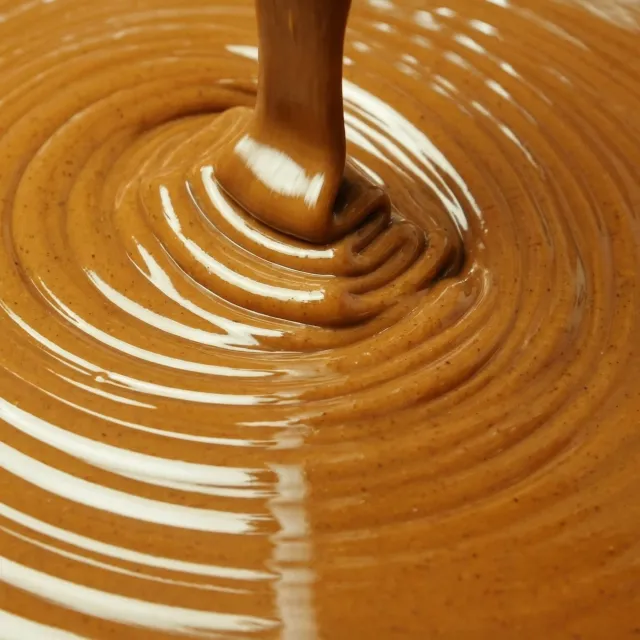 Smooth hazelnut paste being poured